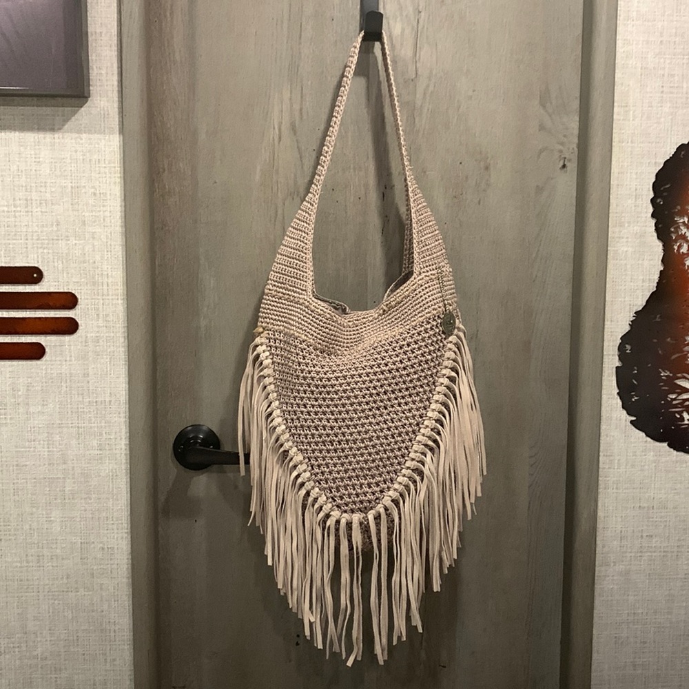 Beautiful hand crocheted purse Grey with grey and silver fringe.